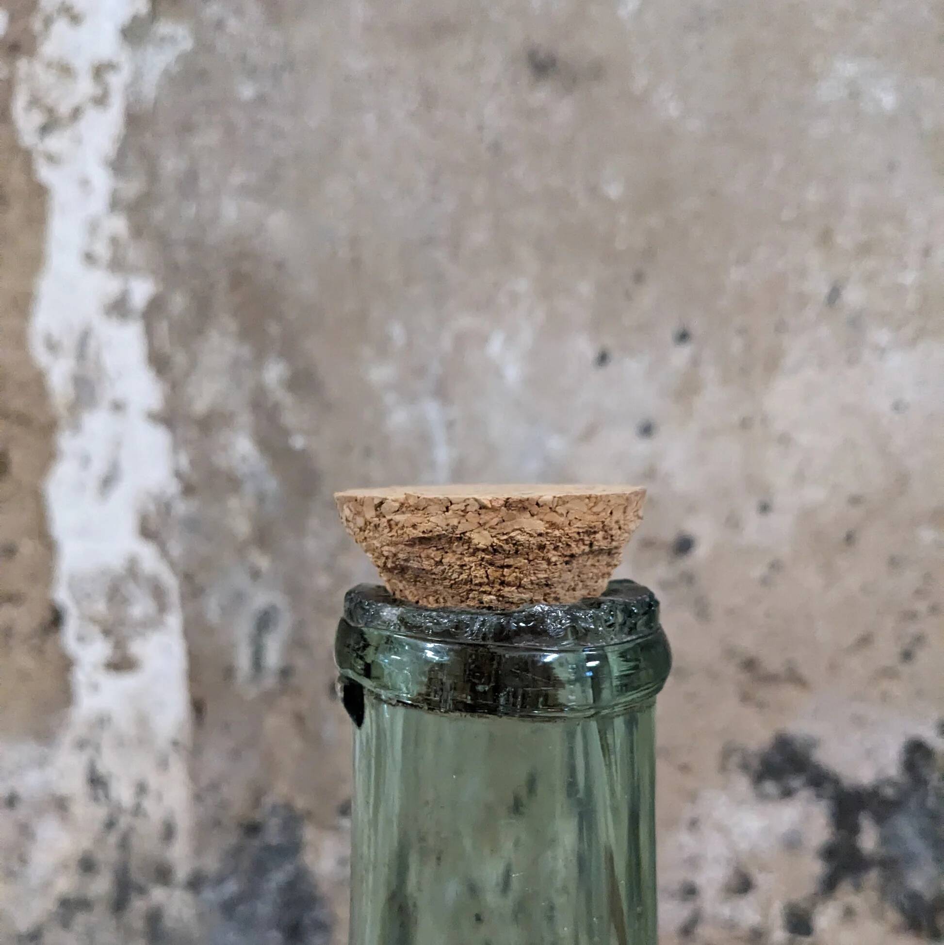 Demijohn in its wicker basket