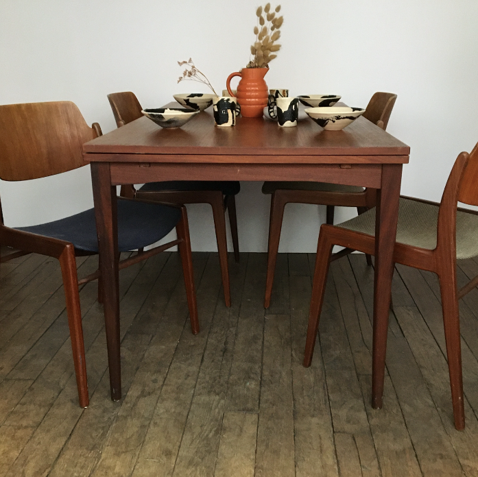 Teak dining table with extensions