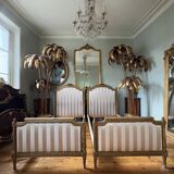 Pair of late 19th-century gilded wooden beds in Louis XVI style.