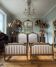 Pair of late 19th-century gilded wooden beds in Louis XVI style.