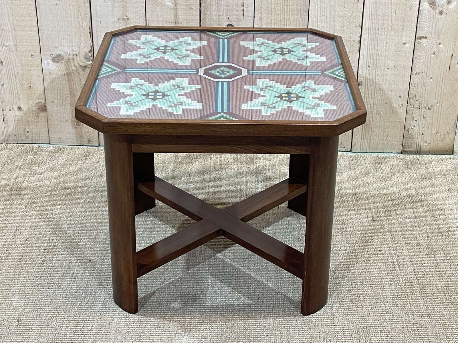 Art Deco side table in mahogany and top covered with a fabric under glass plate