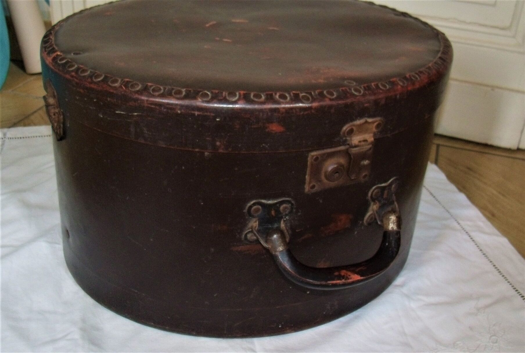Studded old leather hat box