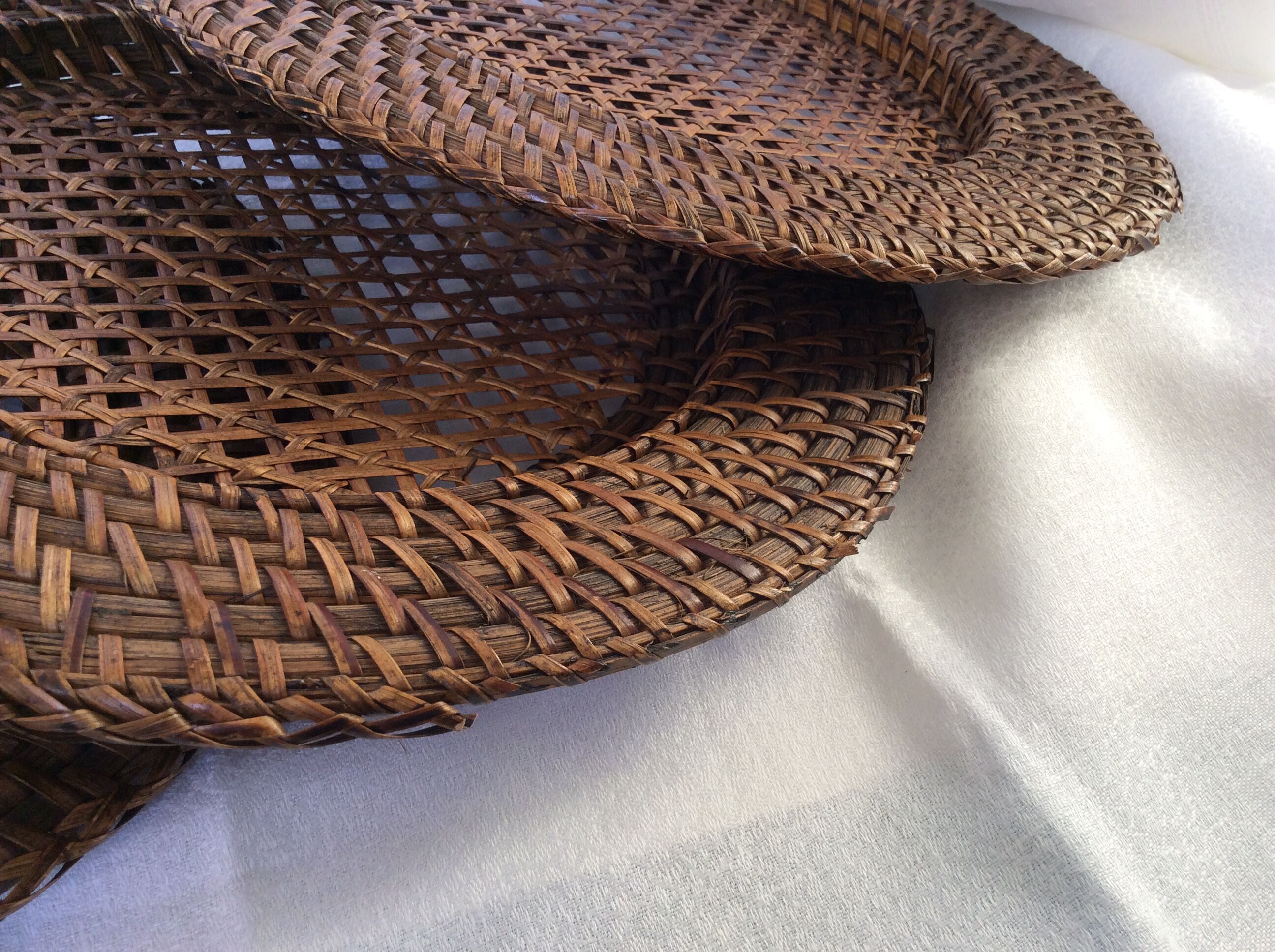 Six rattan under-plates, basketry, wicker