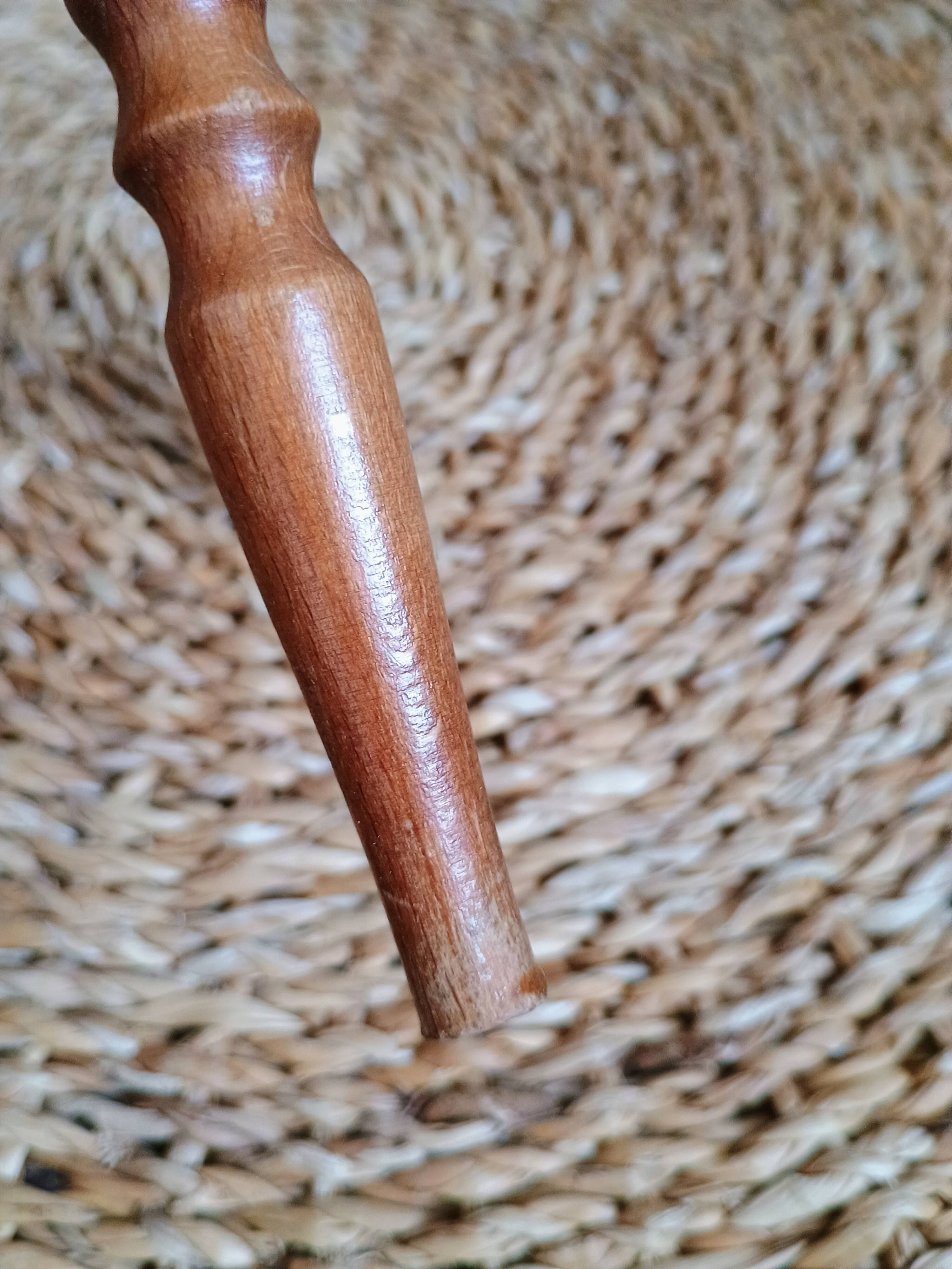 Turned wood magazine rack from the 1950s