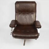 A pair of leather armchairs, 1970s