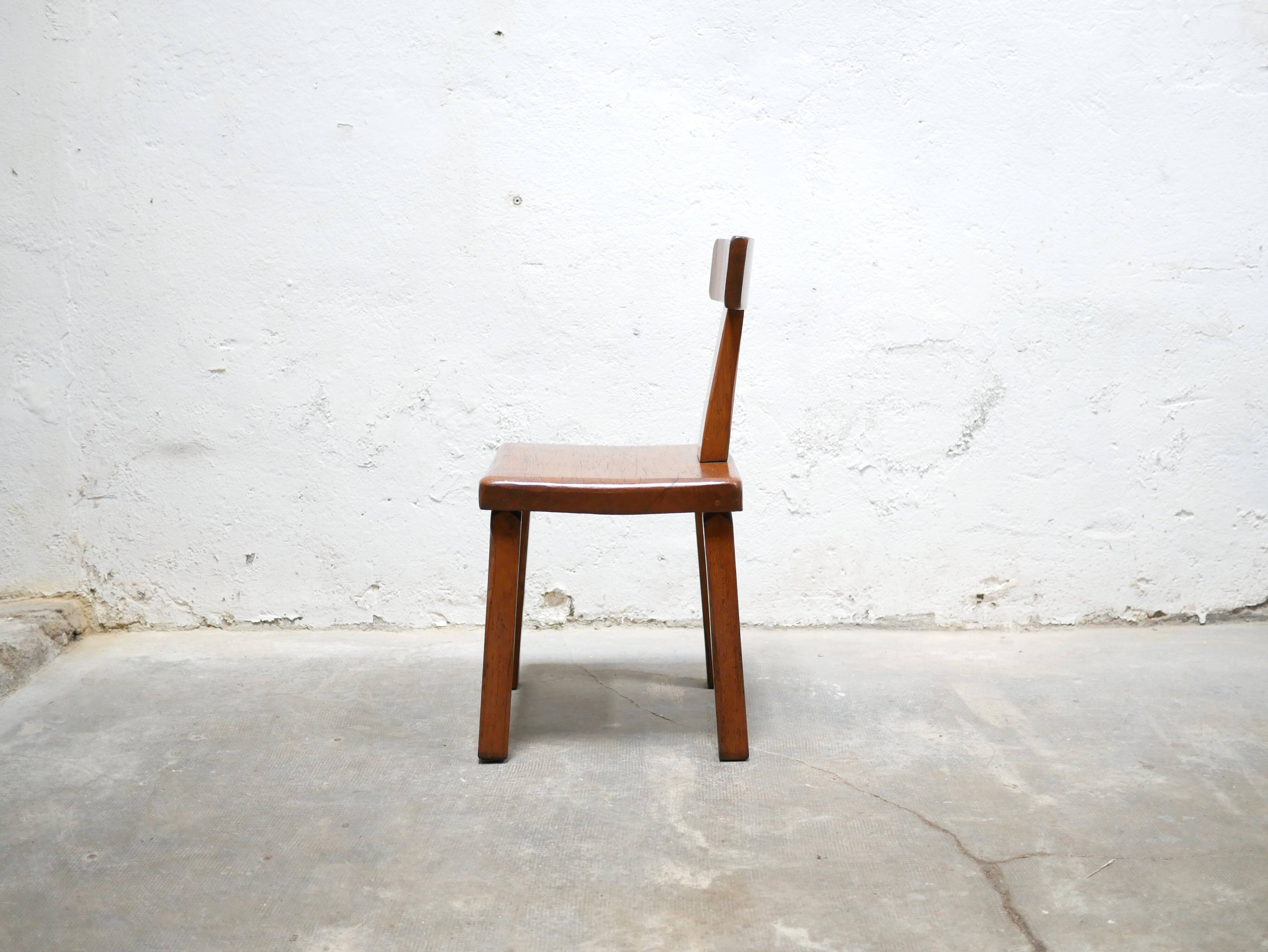 Vintage brutalist wooden T chair