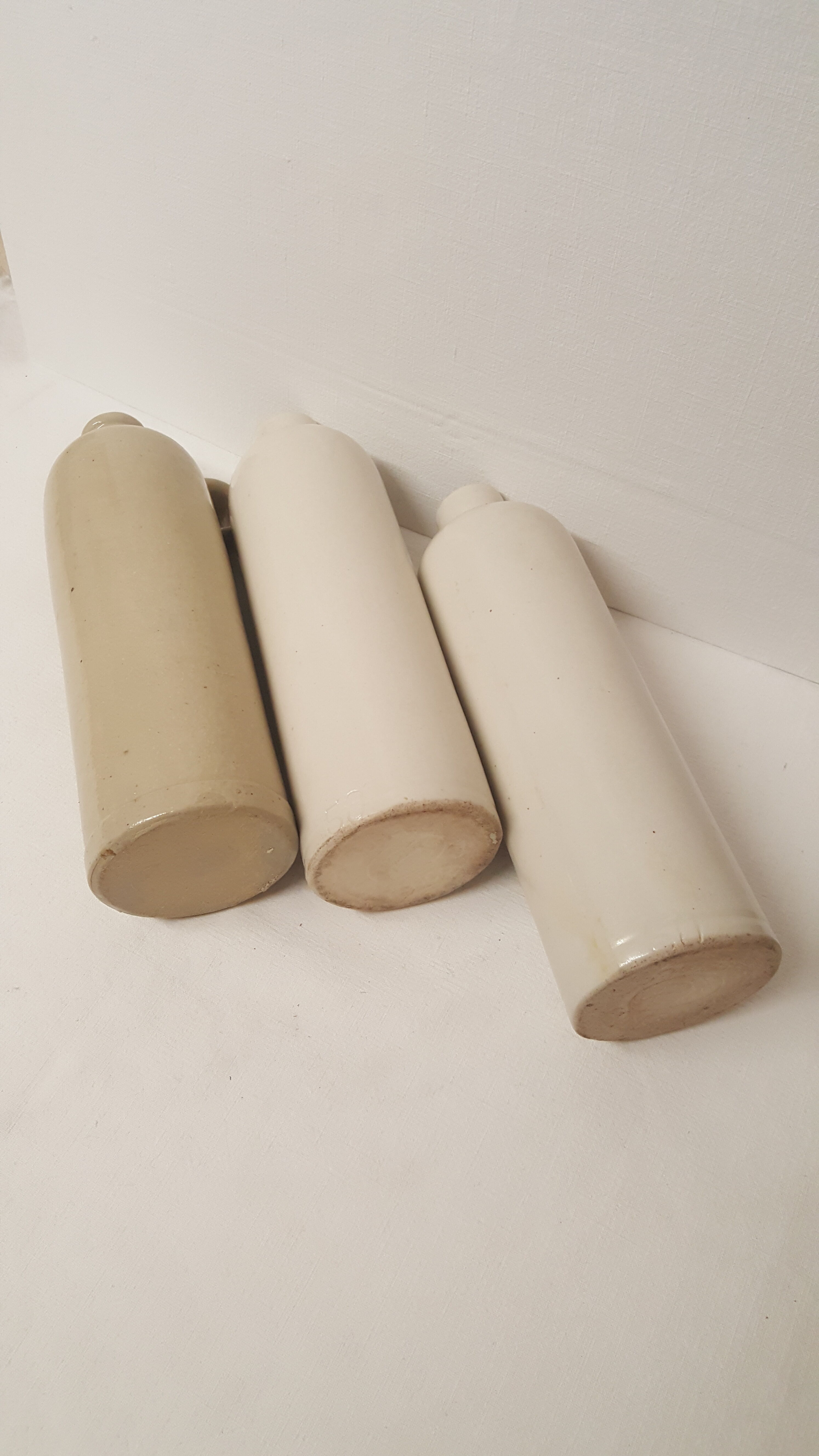 3 sandstone bottles