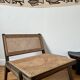 Vintage wooden and cane armchair