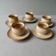 5 glazed stoneware shells, signed