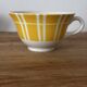 Set of two antique yellow Digoin Sarreguemines cups.