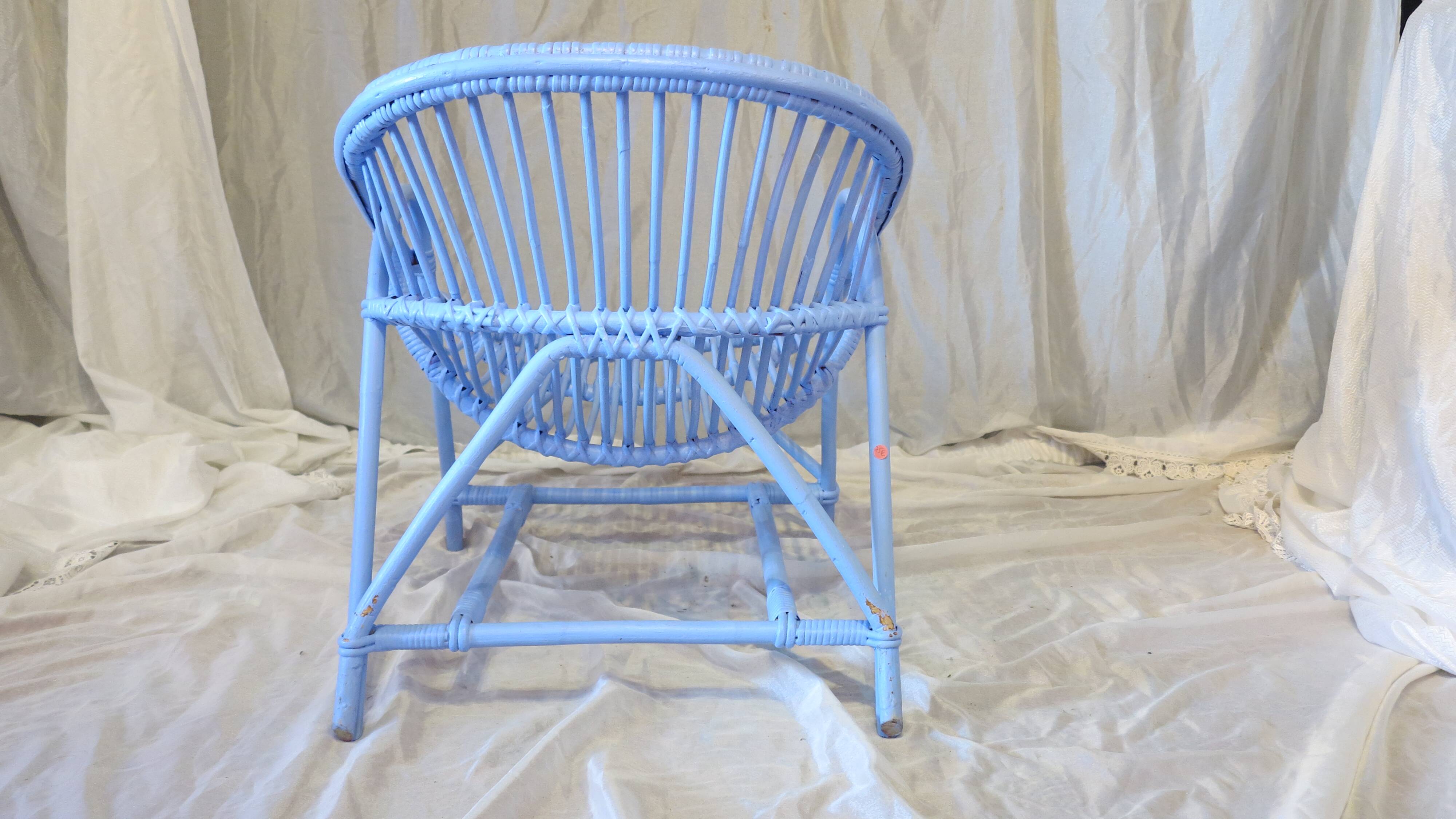 Blue painted rattan armchair