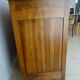 Very much in solid walnut, 3 doors.