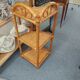 Rattan corner shelf
