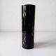 Black opaque glass vase with minimalist style copper inlays