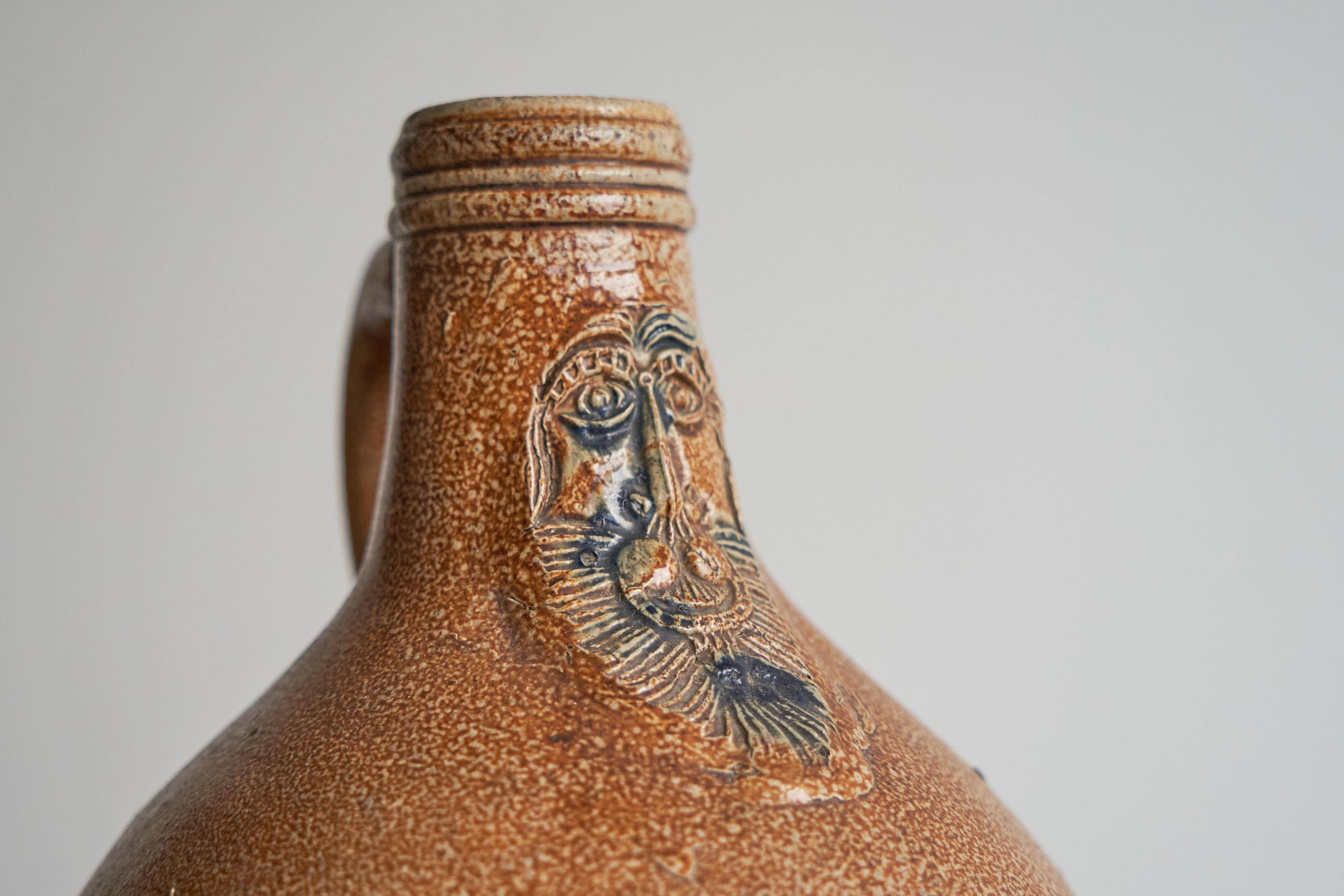 Bartmann jug / Bellarmine 17th century in salt-glazed stoneware