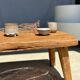 Coffee table in blond teak quadripod