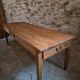 18th-century French farmhouse dining table in oak and chestnut.