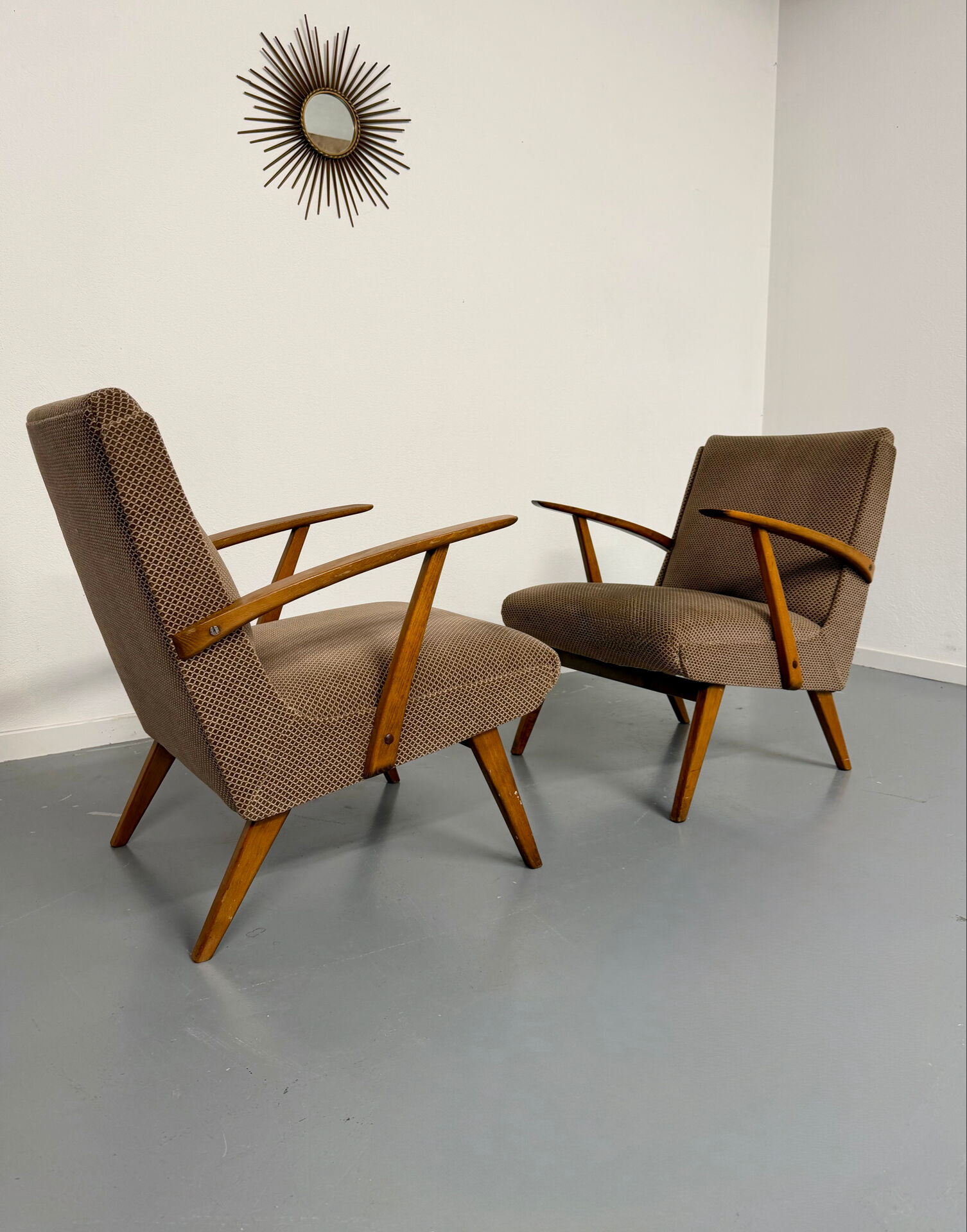 Set of 2 vintage wooden and fabric armchairs designed in the 1960s.