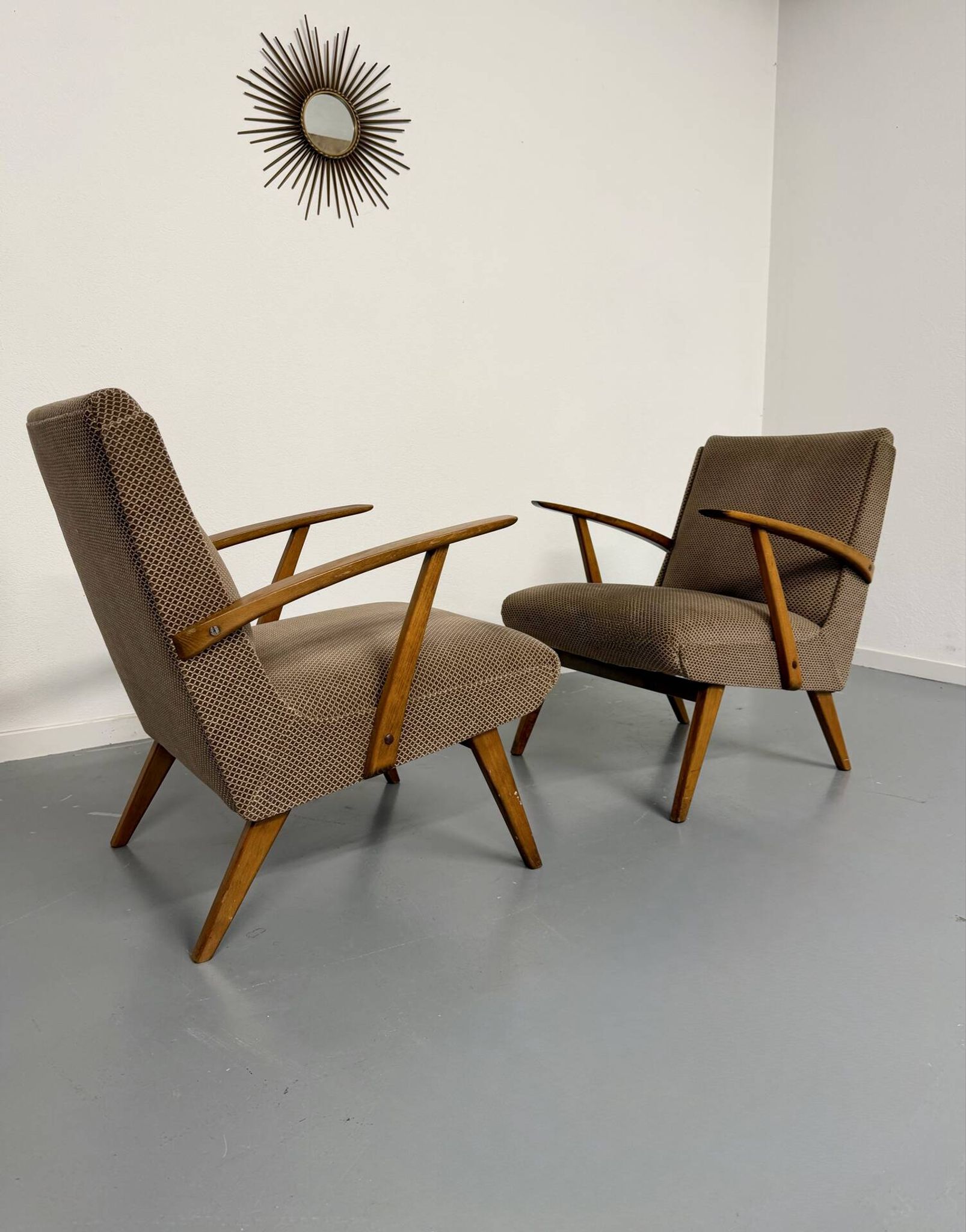 Set of 2 vintage wooden and fabric armchairs designed in the 1960s.