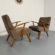 Set of 2 vintage wooden and fabric armchairs designed in the 1960s.