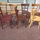 Set of 12 mismatched wooden bistro chairs