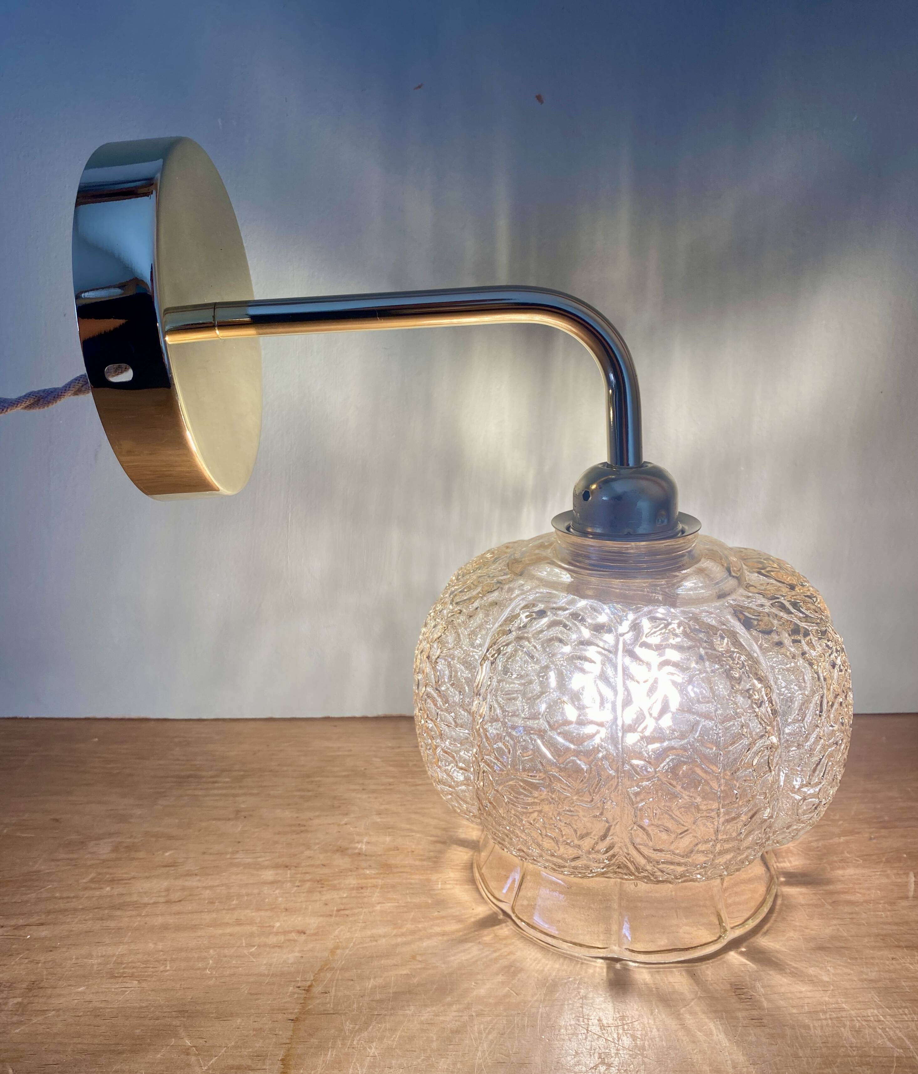 Vintage golden globe angled wall light in amber glass