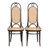 Ensemble de 2 chaises de salle à manger vintage originales en design Thonet avec tressage et bois courbé.