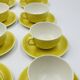 Set of 8 Vintage Boch Frères Yellow Cups and Saucers