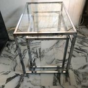Nested tables in chrome metal and glass, Italy circa 1970.