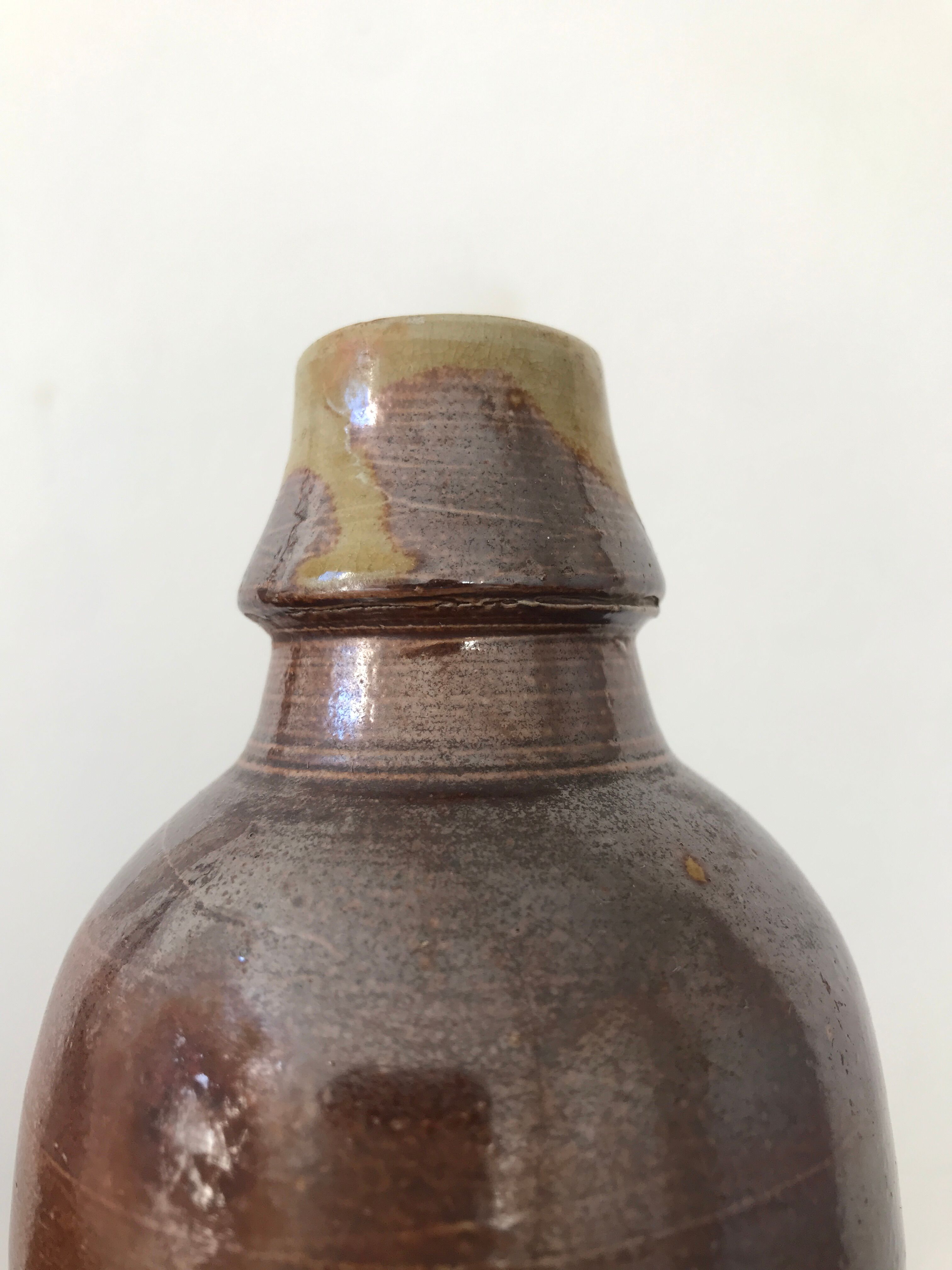 Pair of sandstone bottles