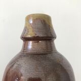 Pair of sandstone bottles