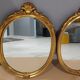 Paire de miroirs oval  doré vintage