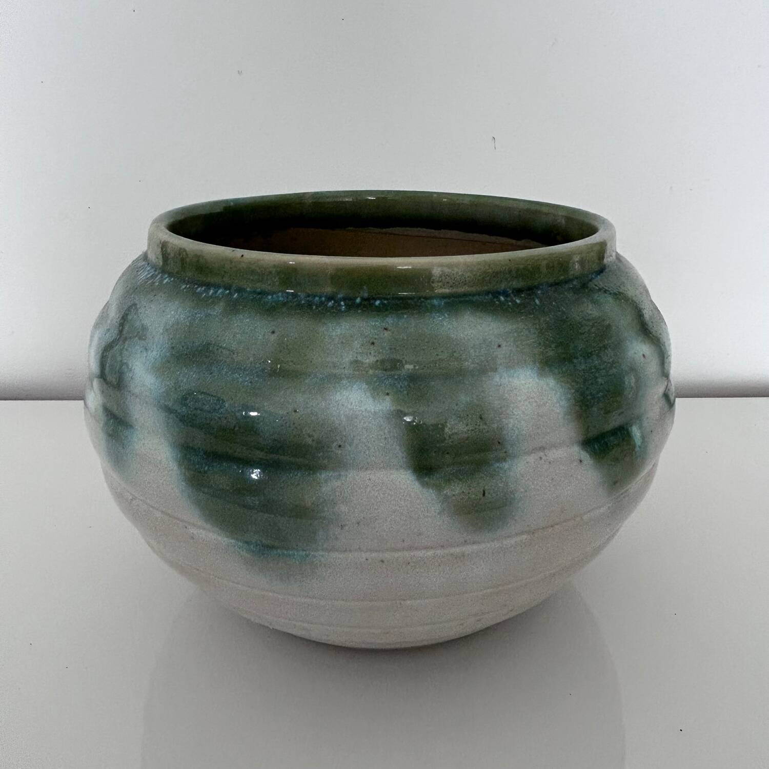 Green flamed stoneware pot