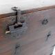 Asian wooden chest with decorative fittings