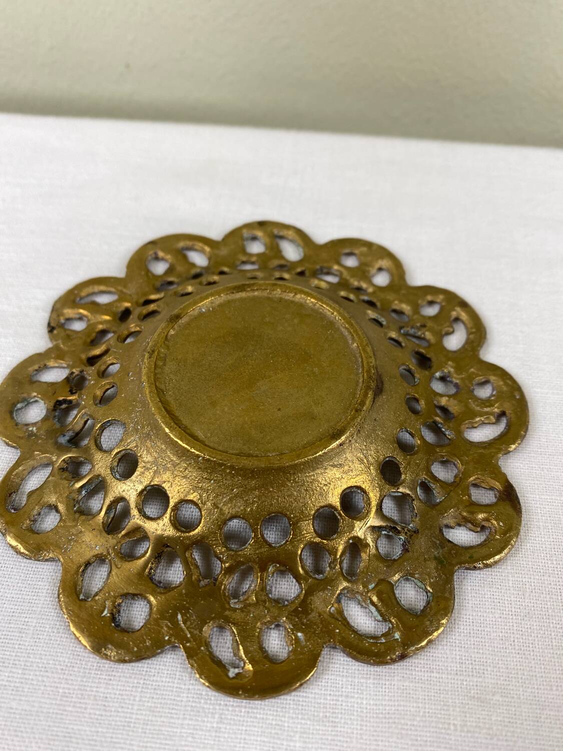 Brass pocket emptier