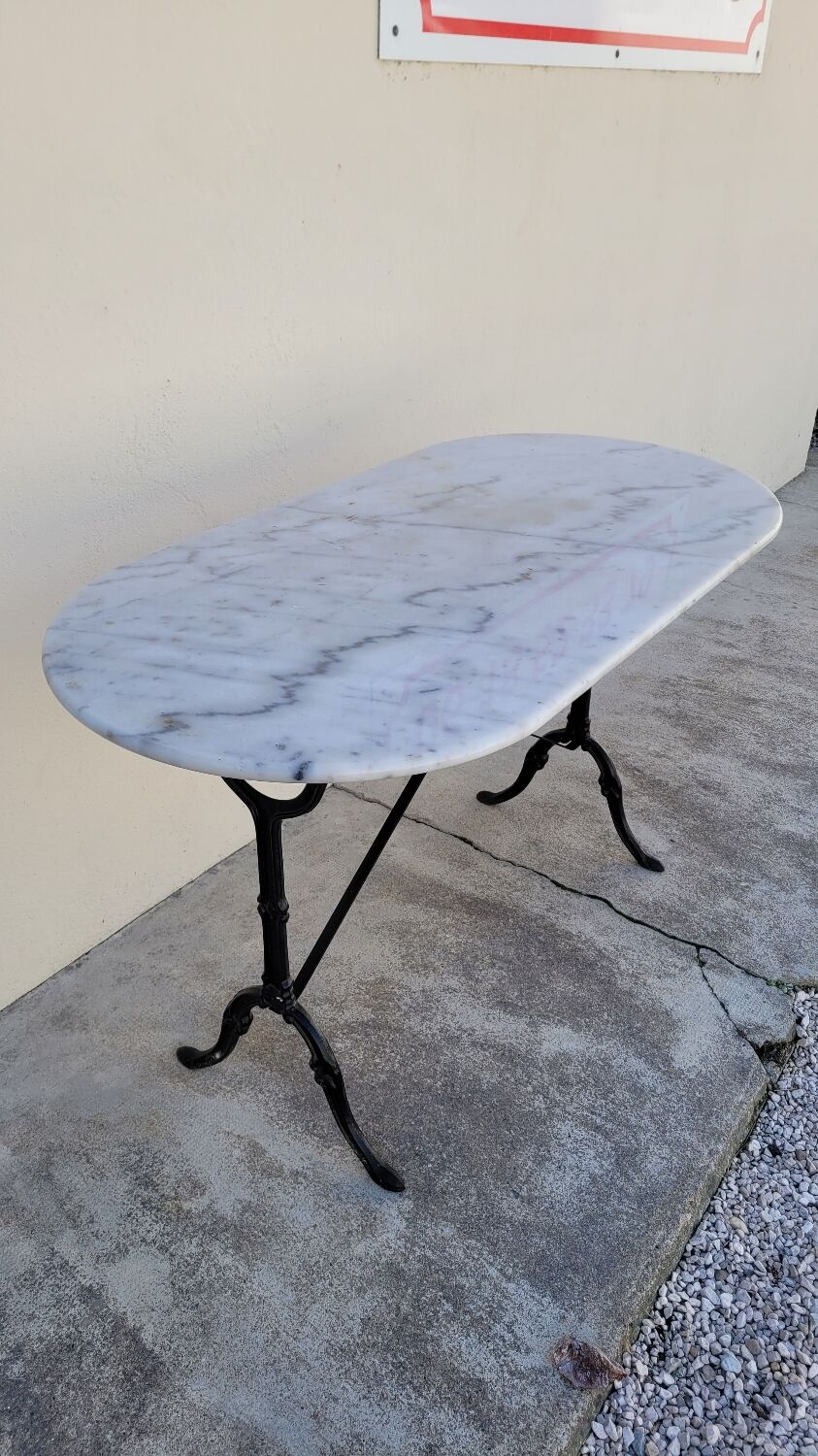 Cast iron bistro table and old oval marble top