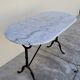 Cast iron bistro table and old oval marble top