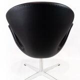 A pair of Swan chairs, model 3320, designed by Arne Jacobsen in 1958