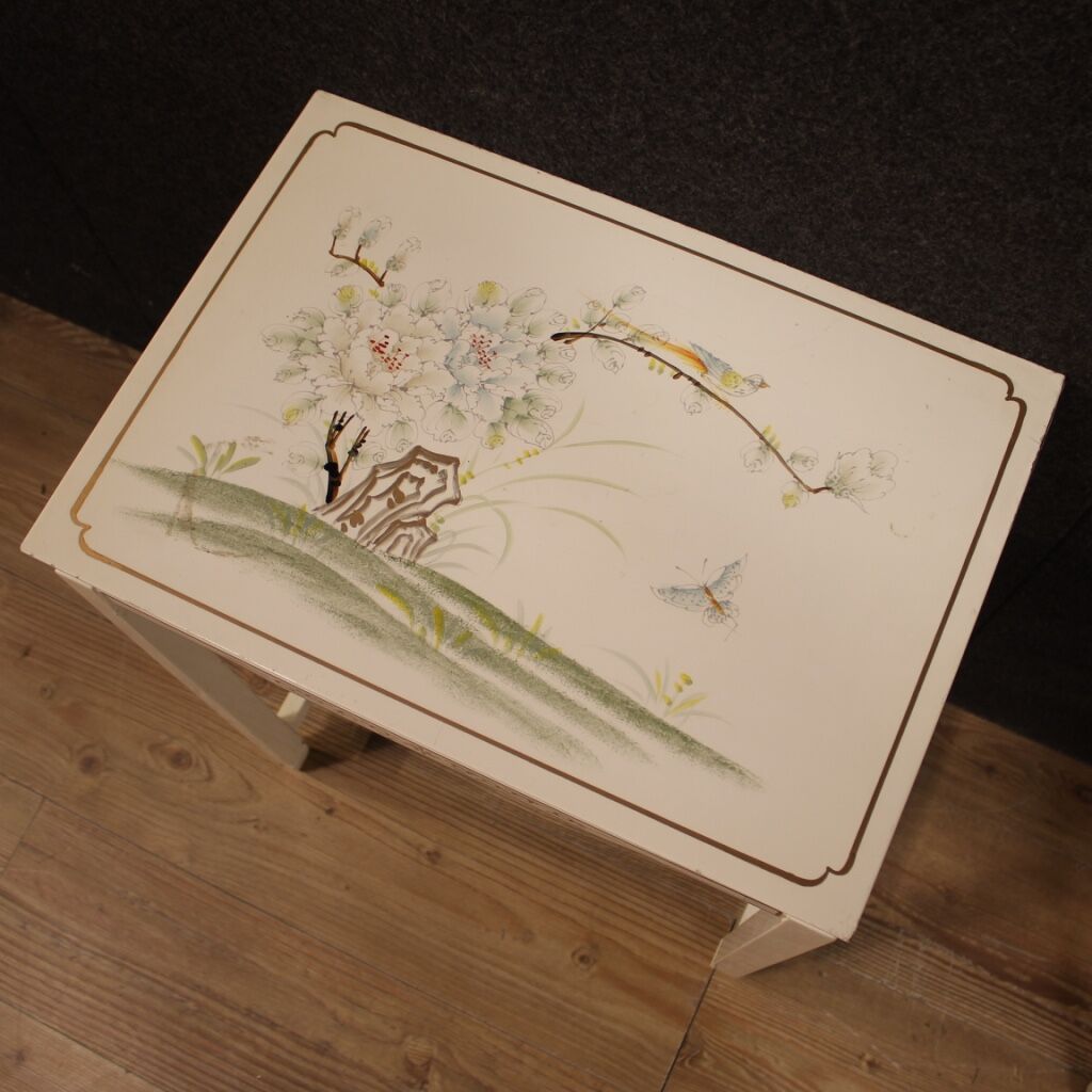 Four lacquered and painted living room coffee tables