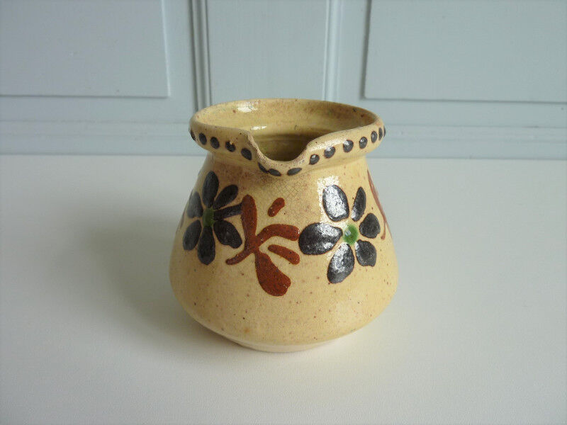 Ancient ceramic milk pot