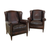 Paire de fauteuils à ailes en cuir de mouton brun foncé vintage