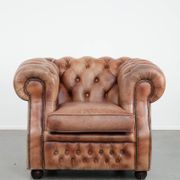 Chesterfield armchair in English style made of cowhide leather