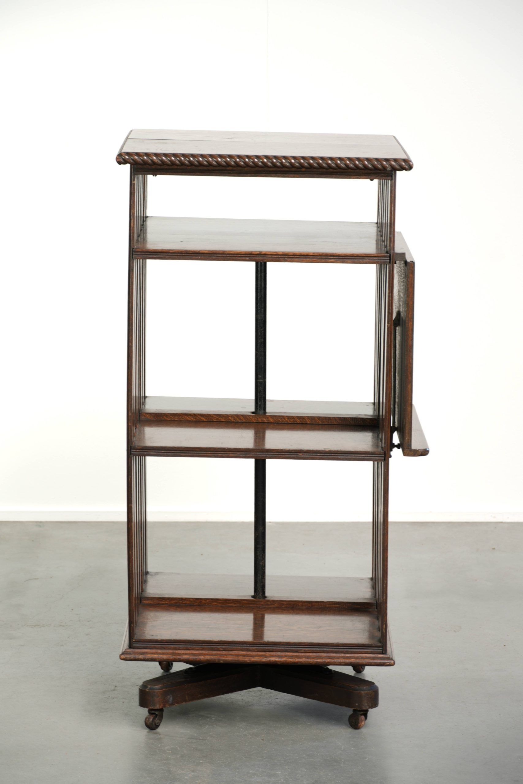 Large antique English oak book carousel from the 19th century
