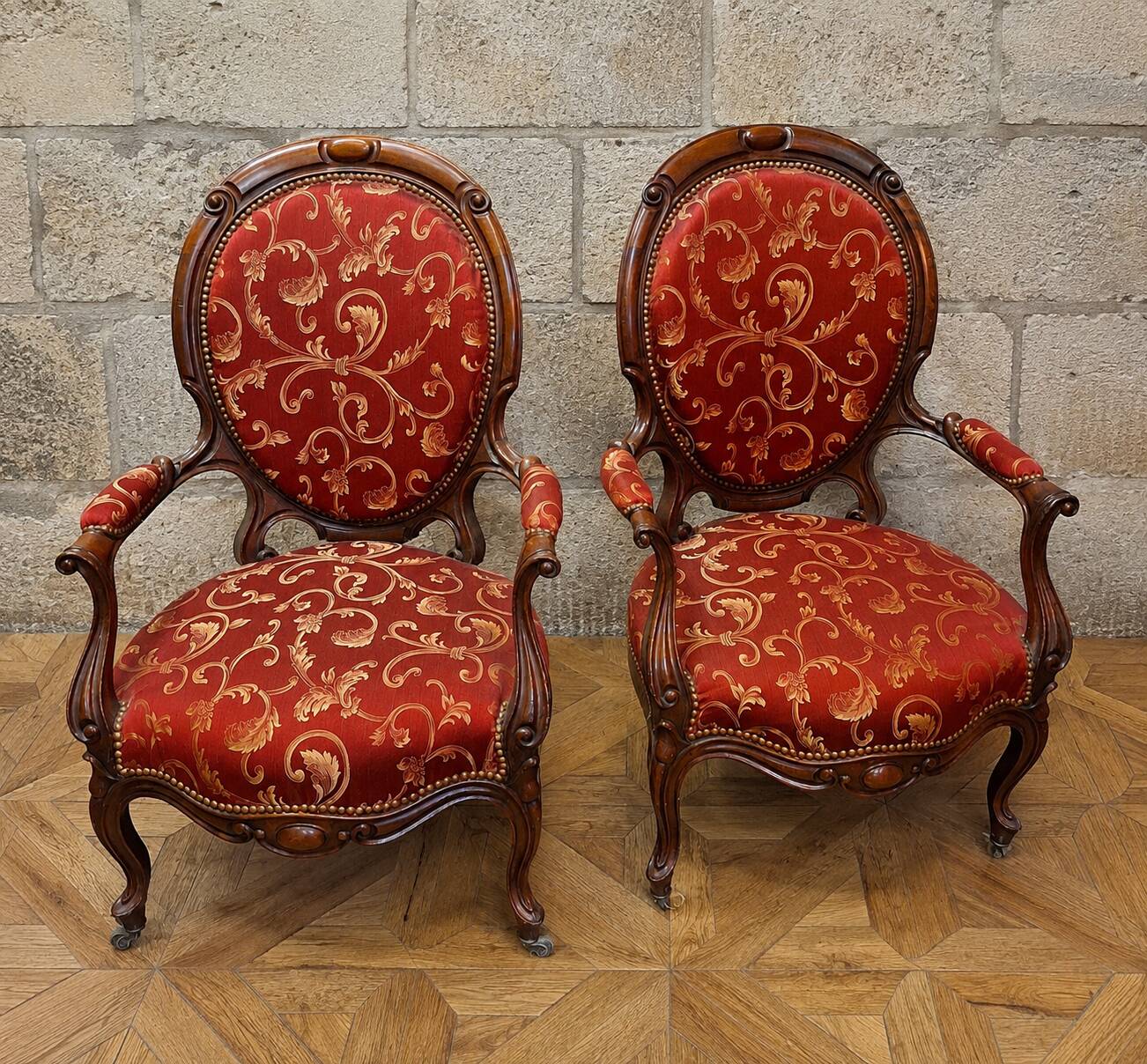 pair of mahogany armchairs, dating from the 19th century