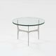Knut HESTERBERG Round coffee table in glass and polished aluminium