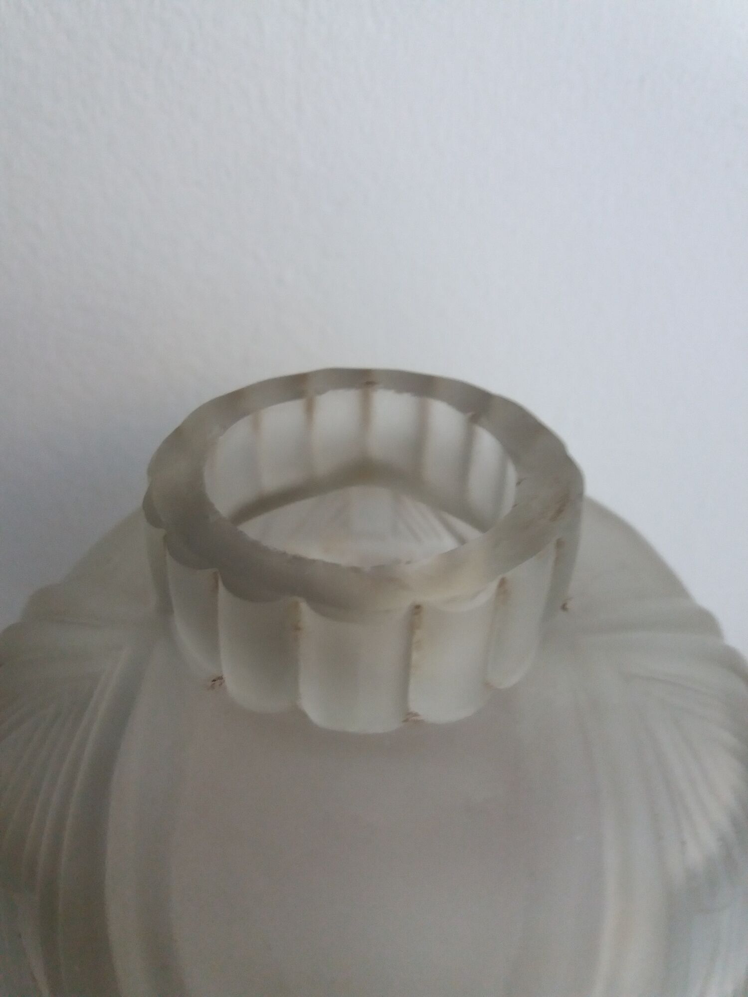 White frosted glass Art Deco vase with geometric patterns