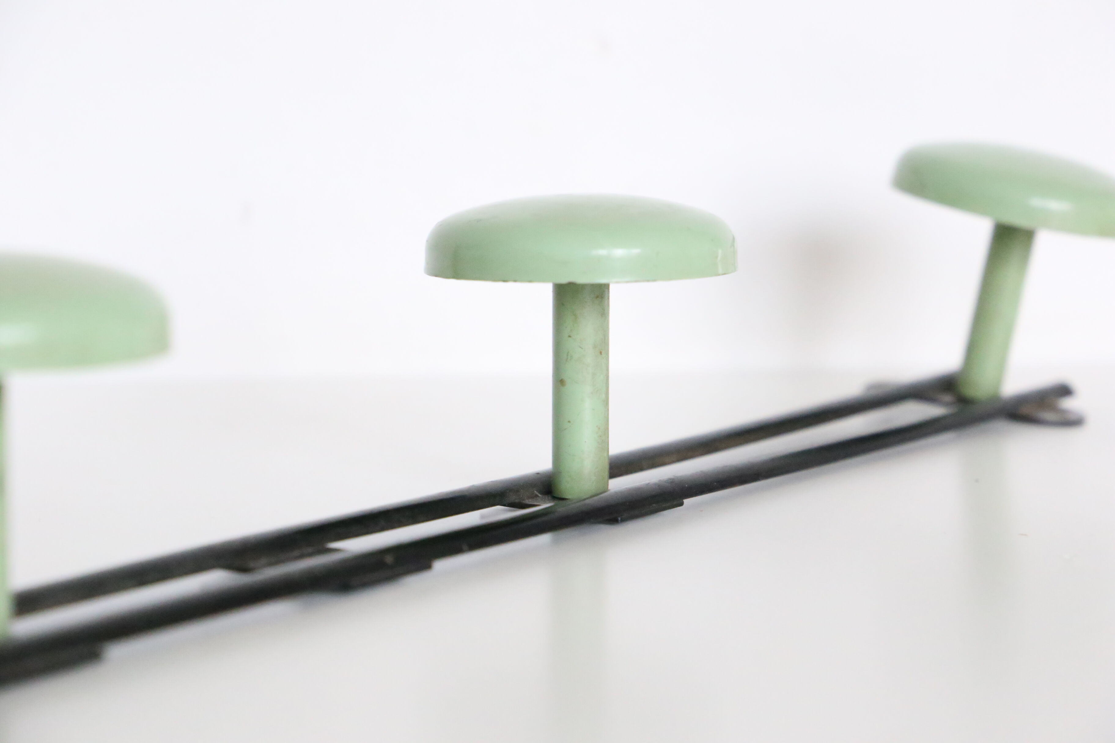 Metal, green and black, vintage wall coat holder