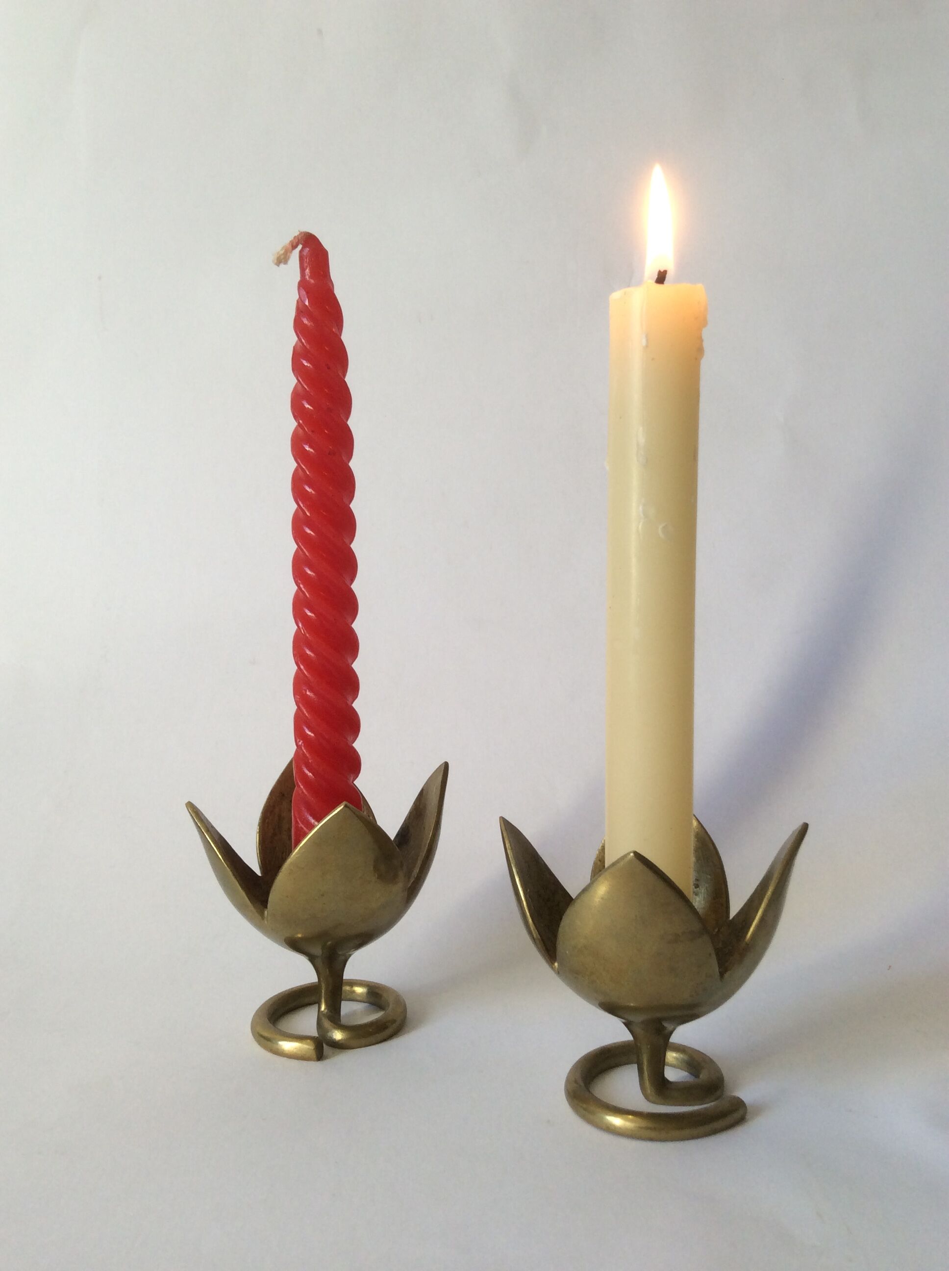 Pair of brass lotus flower candlesticks