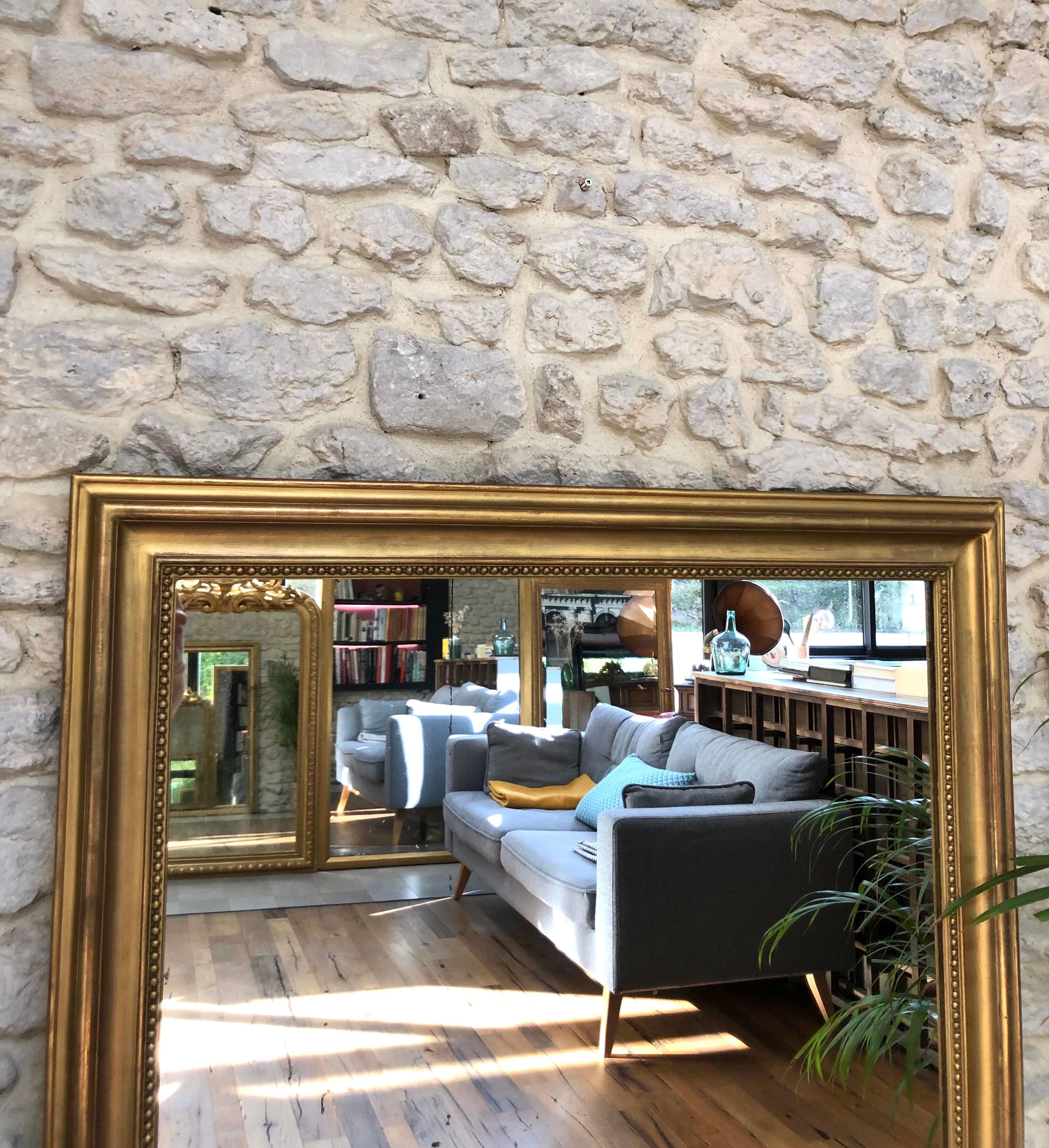 Old fireplace mirror 144cm/97.5cm, pearled, late 19th century, gilded with pricked ice leaf.