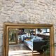 Old fireplace mirror 144cm/97.5cm, pearled, late 19th century, gilded with pricked ice leaf.